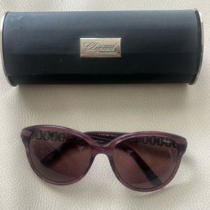 Chopped purple sunglasses with 💎 gemstones on side. Case included